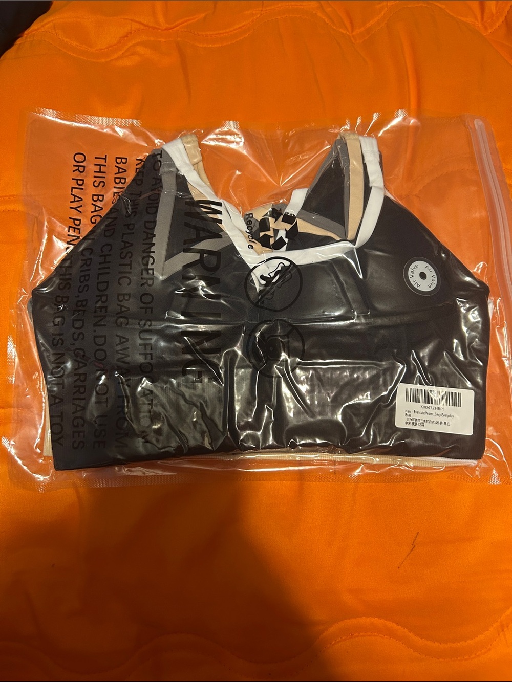 Amazon Black, Tan, White, and Grey Seamless Sports Bras Set